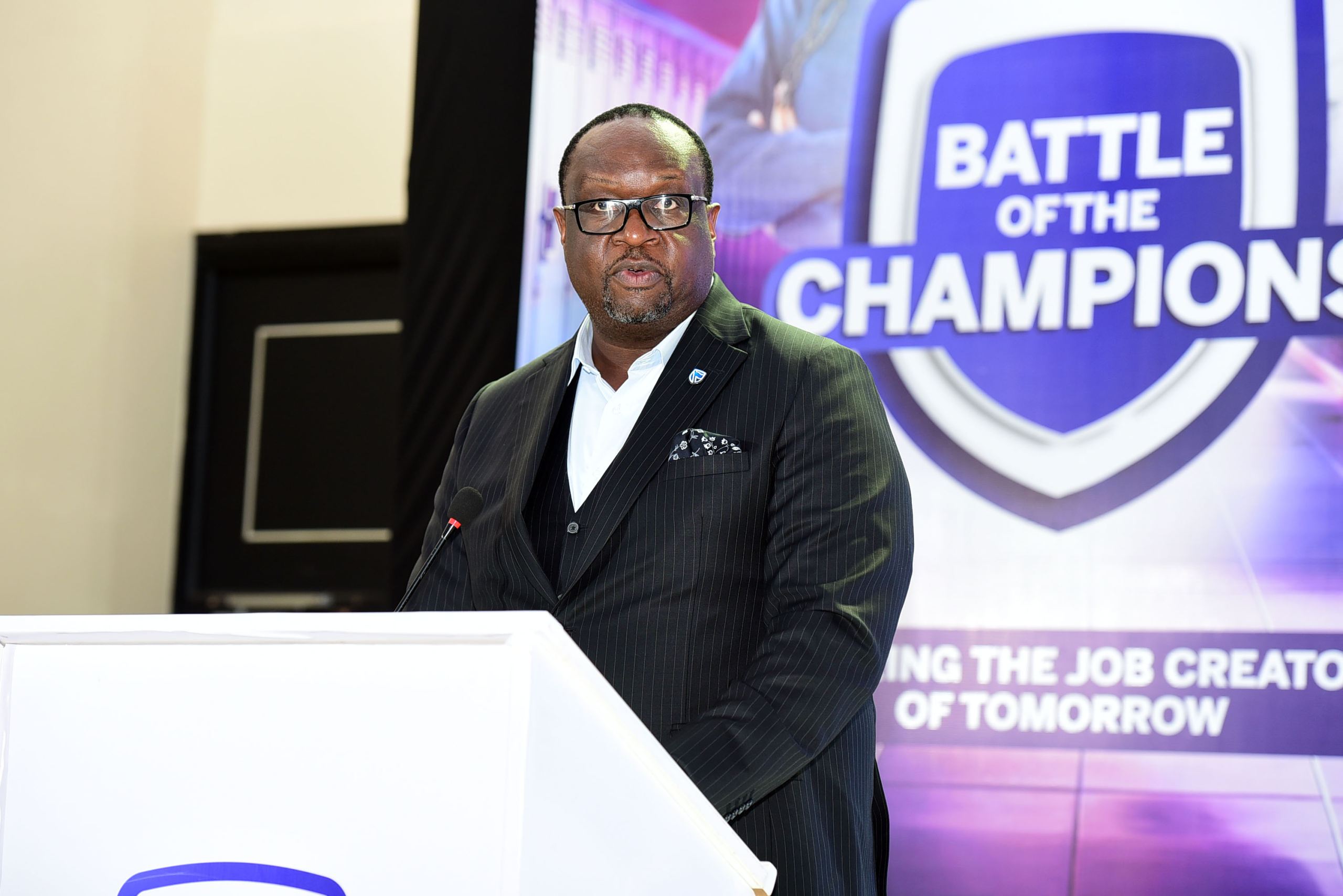 Mumba Kalifungwa, the Stanbic Bank Chief Executive making remarks at the NSC grand finale in Kampala