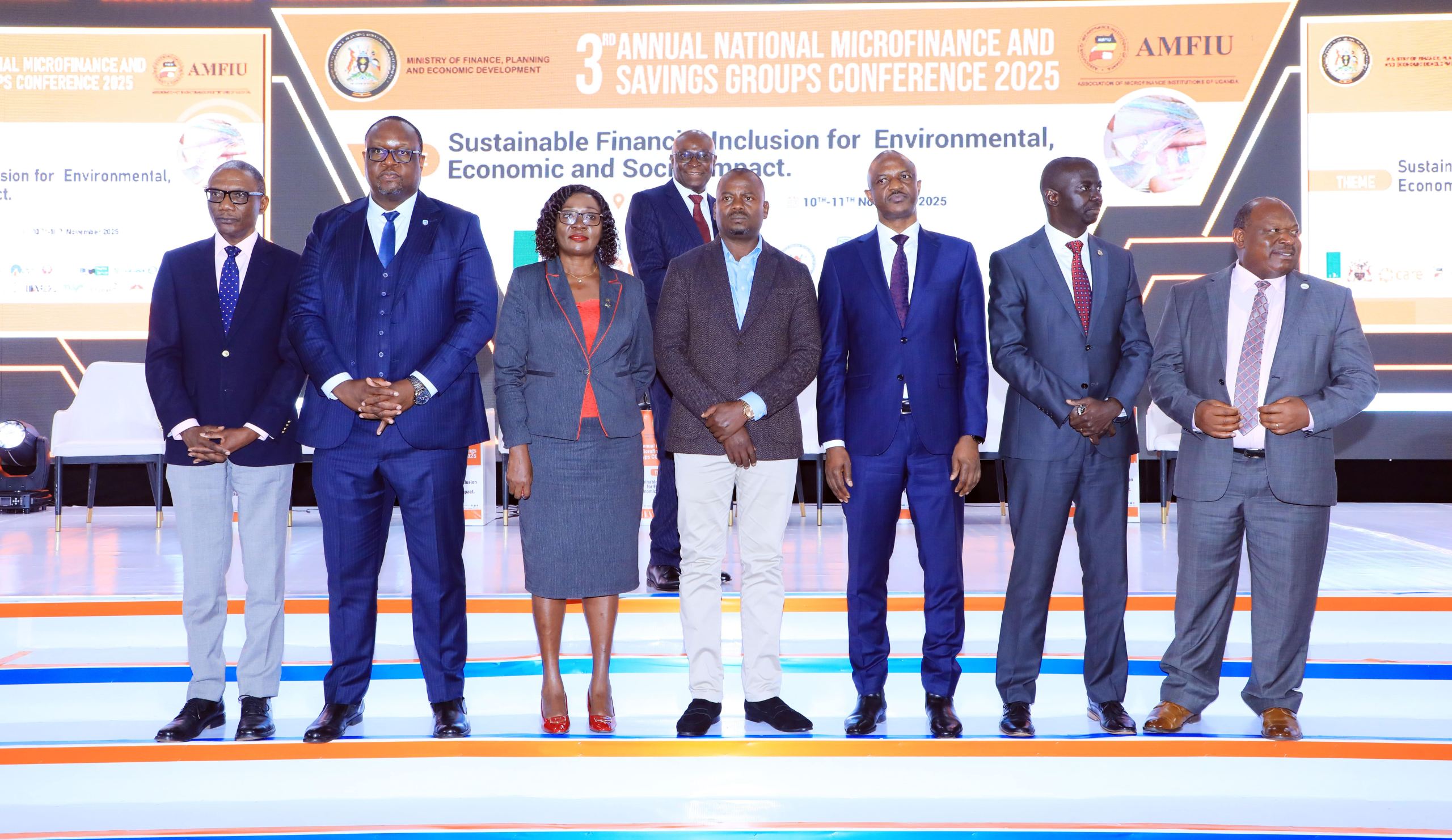 Mumba Kalifungwa, Stanbic Chief Executive (2nd Left) Minister Haruna Kasolo (C) and Ramadan Ggoobi the PSST during the Conference at Hotel Africana in Kampala