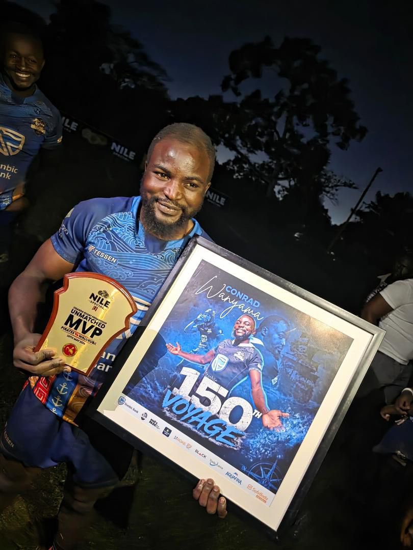 Conrad Wanyama displays some of the gifts