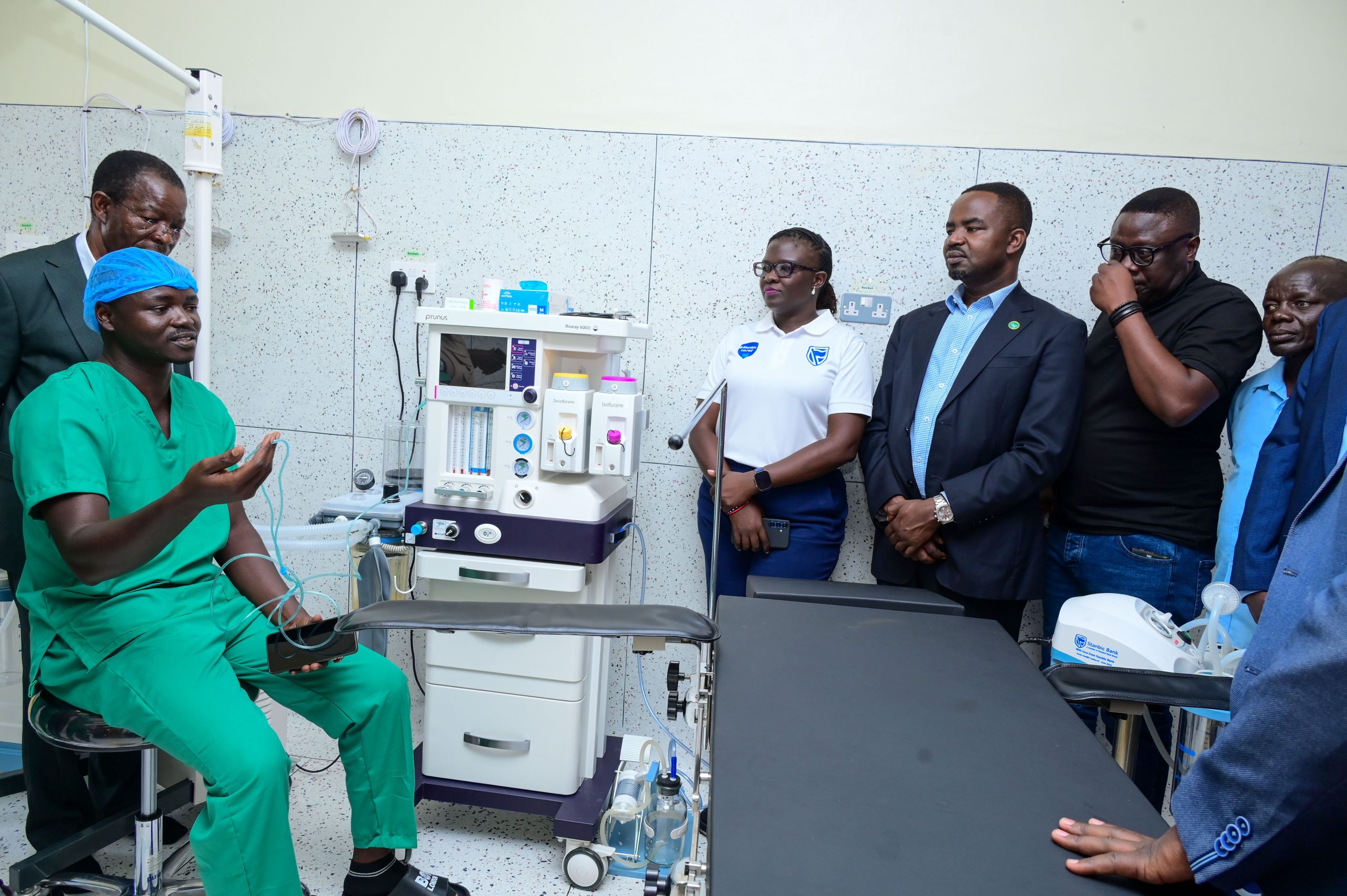 An anaesthetist from Karita Health Centre IV explains how the different theatre equipment operates to the different stakeholders