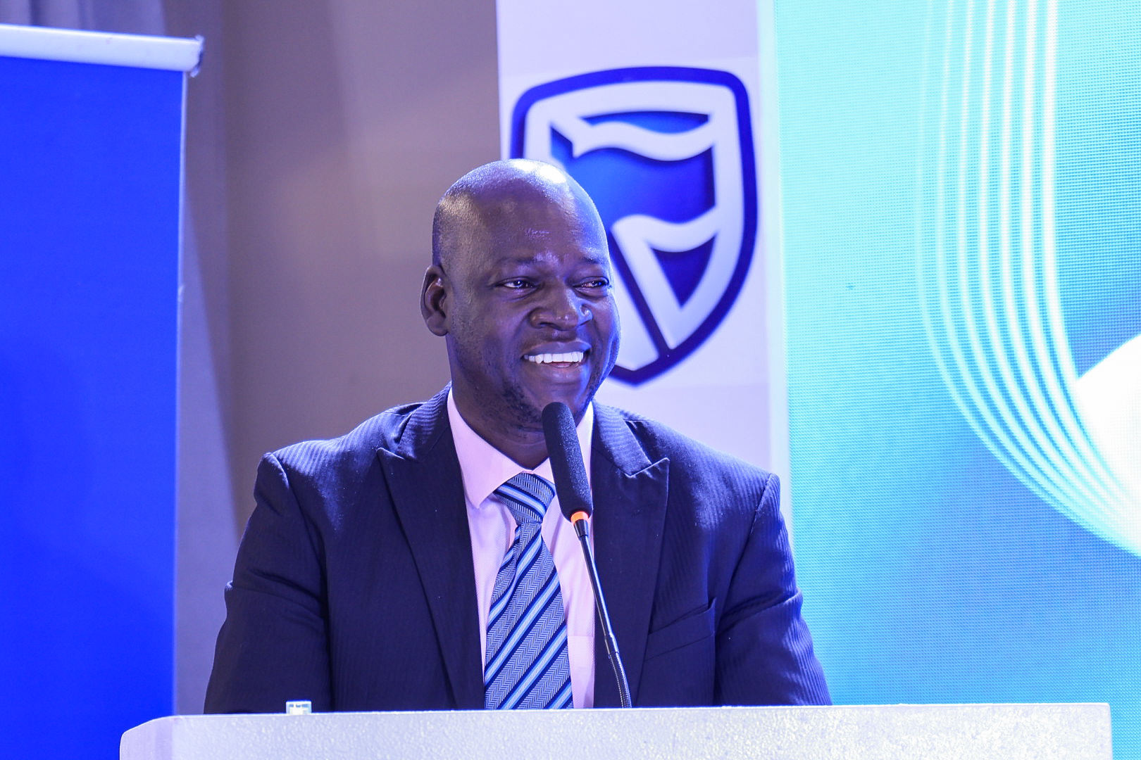 Eng. David Birimumaaso, Assistant Commissioner for Energy Efficiency and Conservation at the Ministry of Energy making remarks