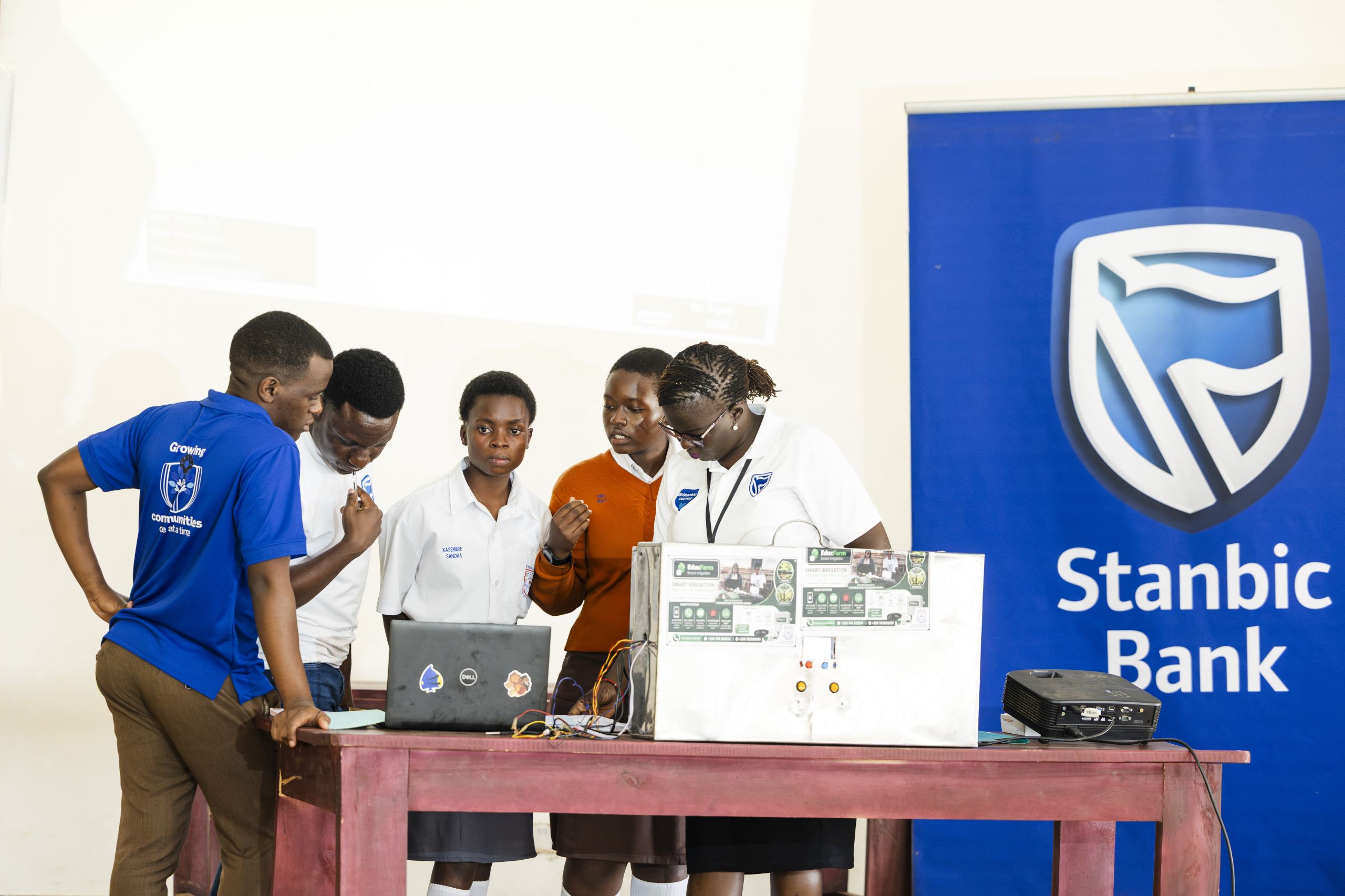 Stanbic Bank Manager Corporate Social Investment (CSI), Diana Ondoga interacting with the students Stanbic Bank Manager Corporate Social Investment (CSI), Diana Ondoga interacting with the students