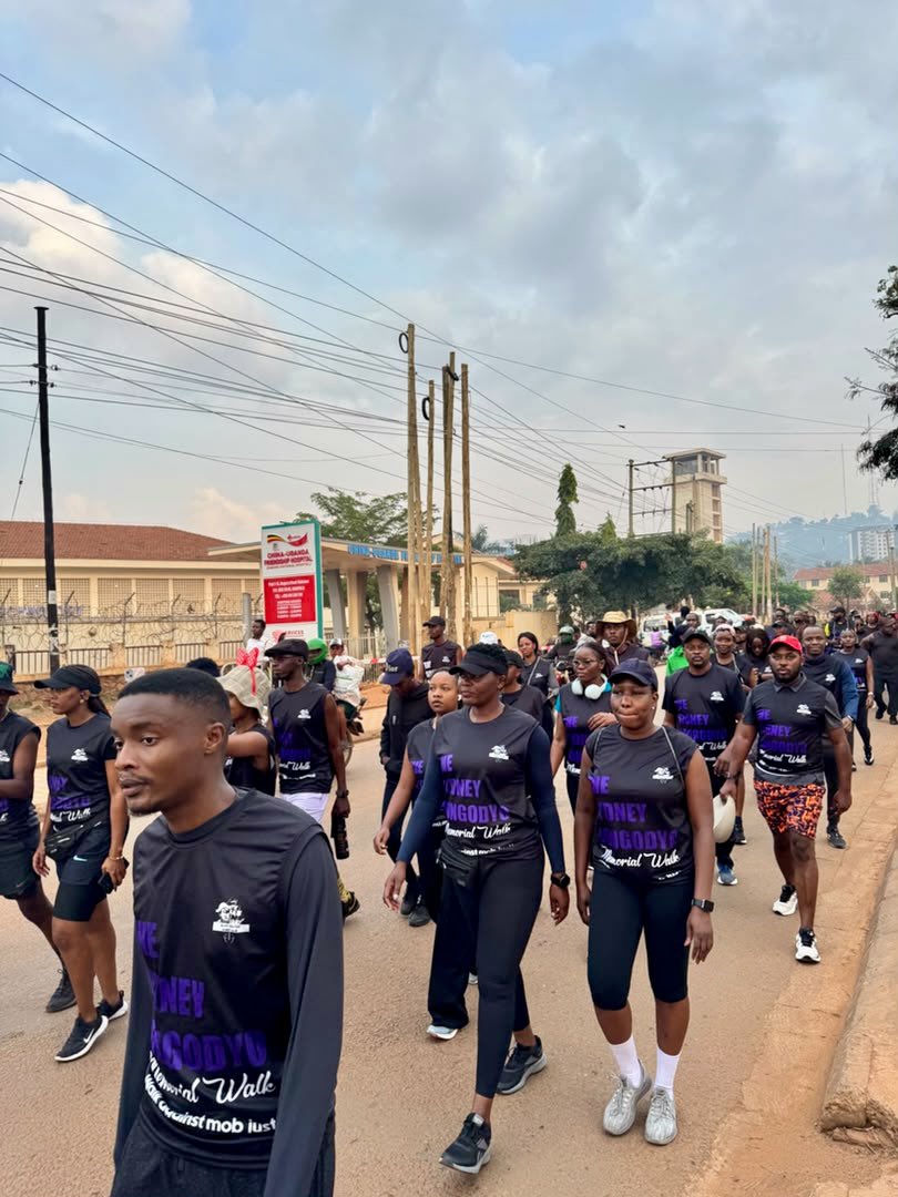 Supporters and Concerned citizens march through Kampala during the Sydney Gongodyo Memorial Walk Supporters and Concerned citizens march through Kampala during the Sydney Gongodyo Memorial Walk