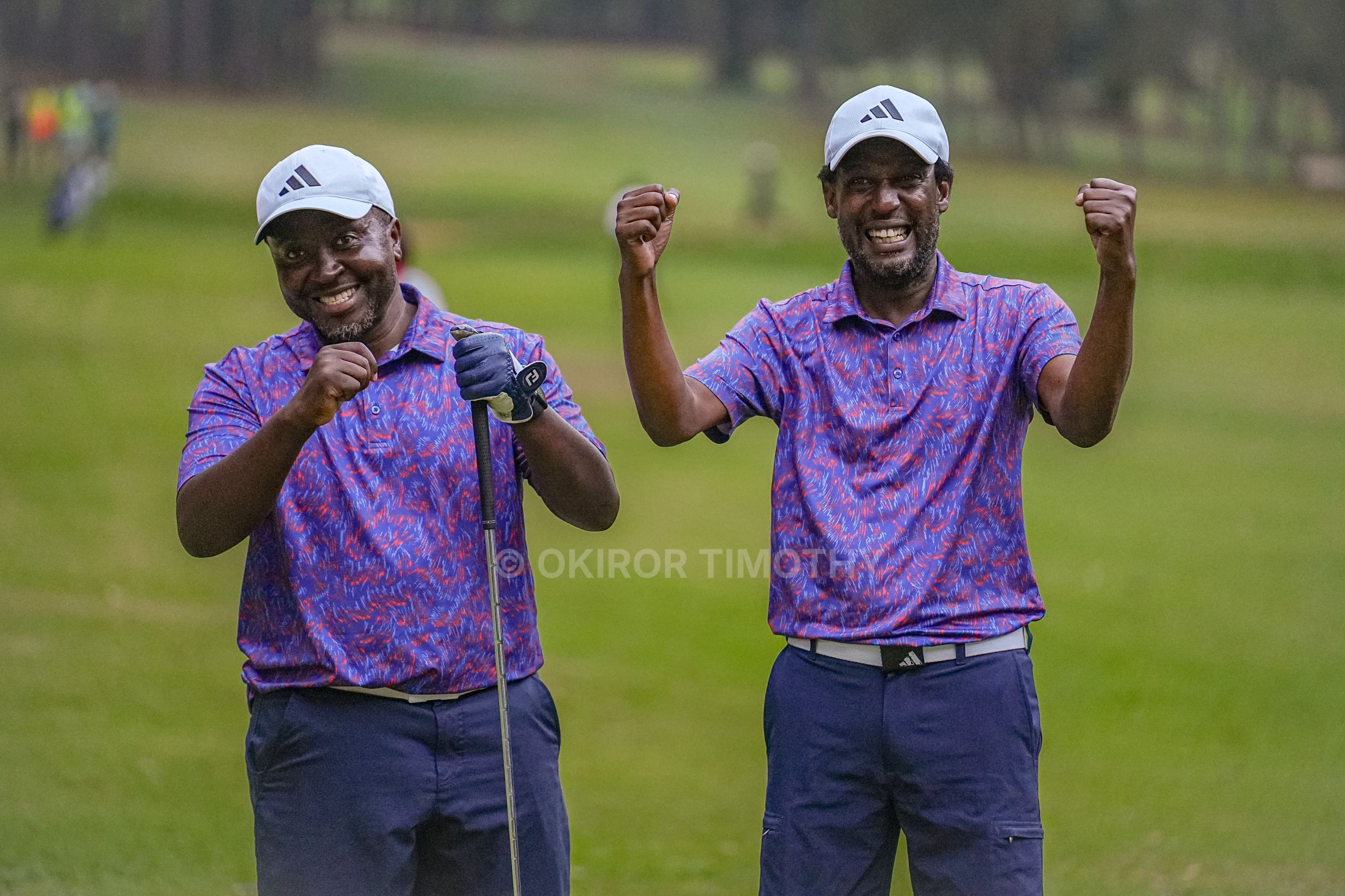 Sam Kacungira and Vicent Katutsi celebrating their mega during the Stanbic Entebbe Matchplay final - PHOTO CREDIT - Okiror Timothy