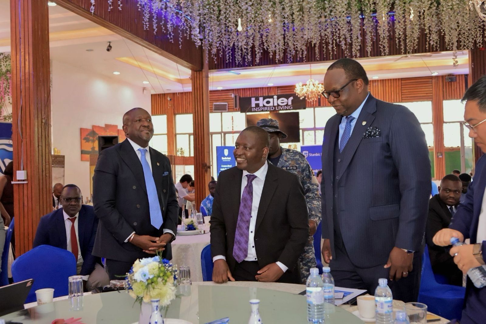 Standard Bank’s Andrew Mashanda (left), Minister David Bahati (centre) and Stanbic Bank’s CE Mumba Kalifungwa (right) at the launch of CIPS on Tuesday. Standard Bank's Andrew Mashanda (left), Minister David Bahati (centre) and Stanbic Bank's CE Mumba Kalifungwa (right) at the launch of CIPS on Tuesday.