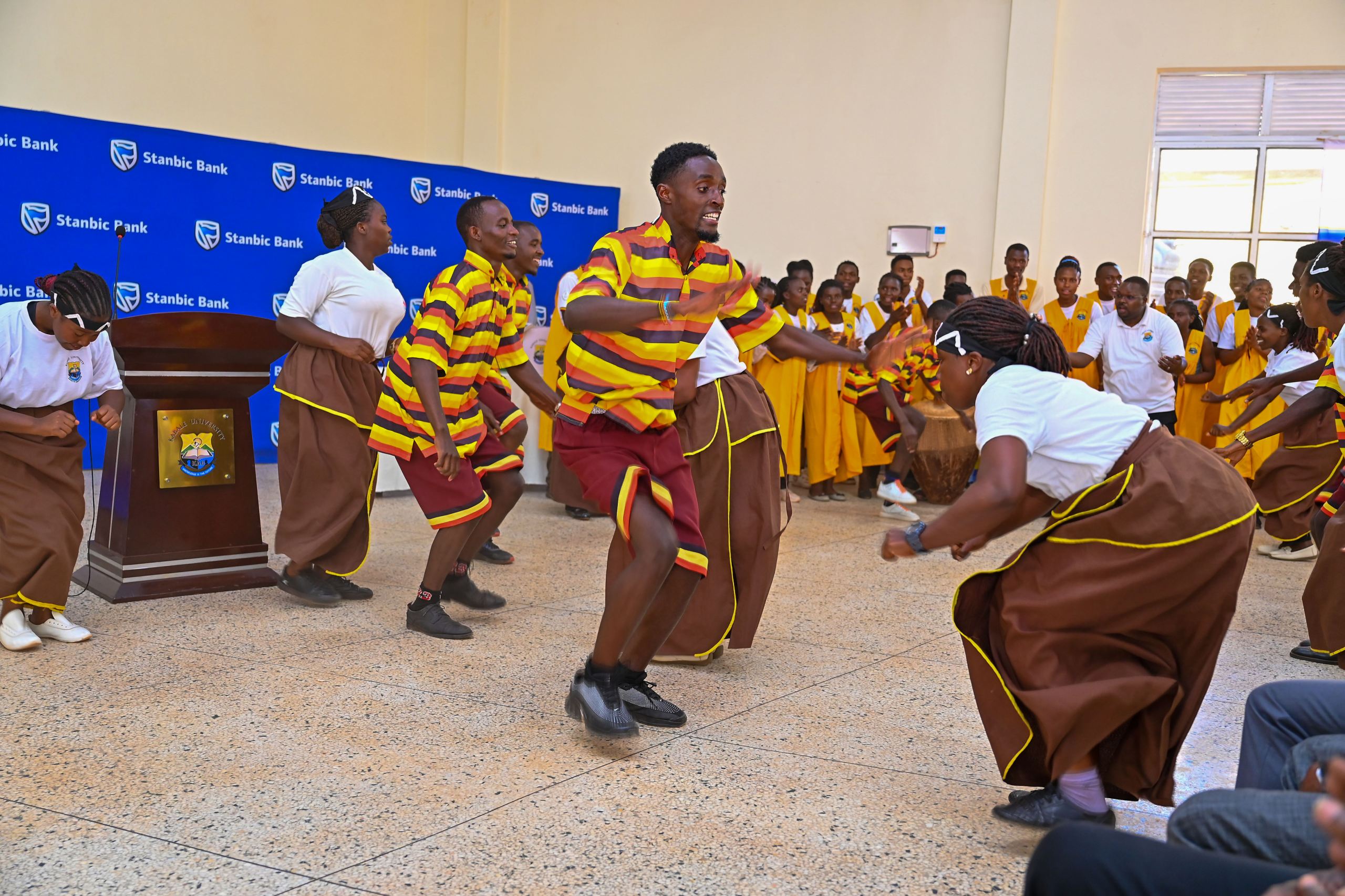 Kabale University student entertain the congregation with a traditional dance