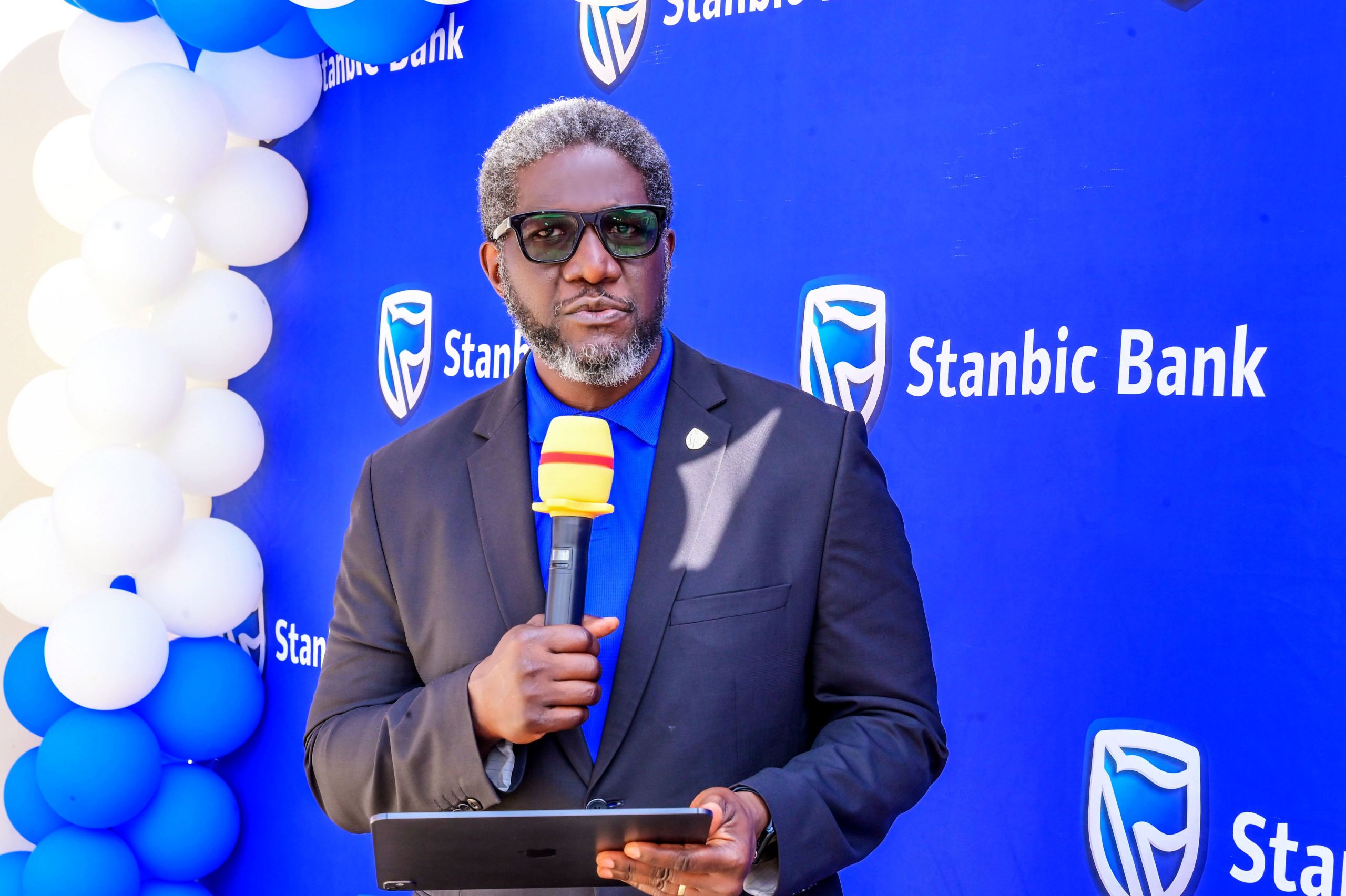 Sam Fredrick Mwogeza, the Executive Director Stanbic Bank Uganda making remarks Sam Fredrick Mwogeza, the Executive Director Stanbic Bank Uganda making remarks