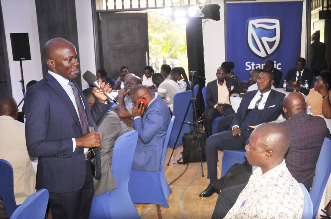 Stanbic Bank's Moses Kakeeto speaking to participants during the Business Forum in Mbale